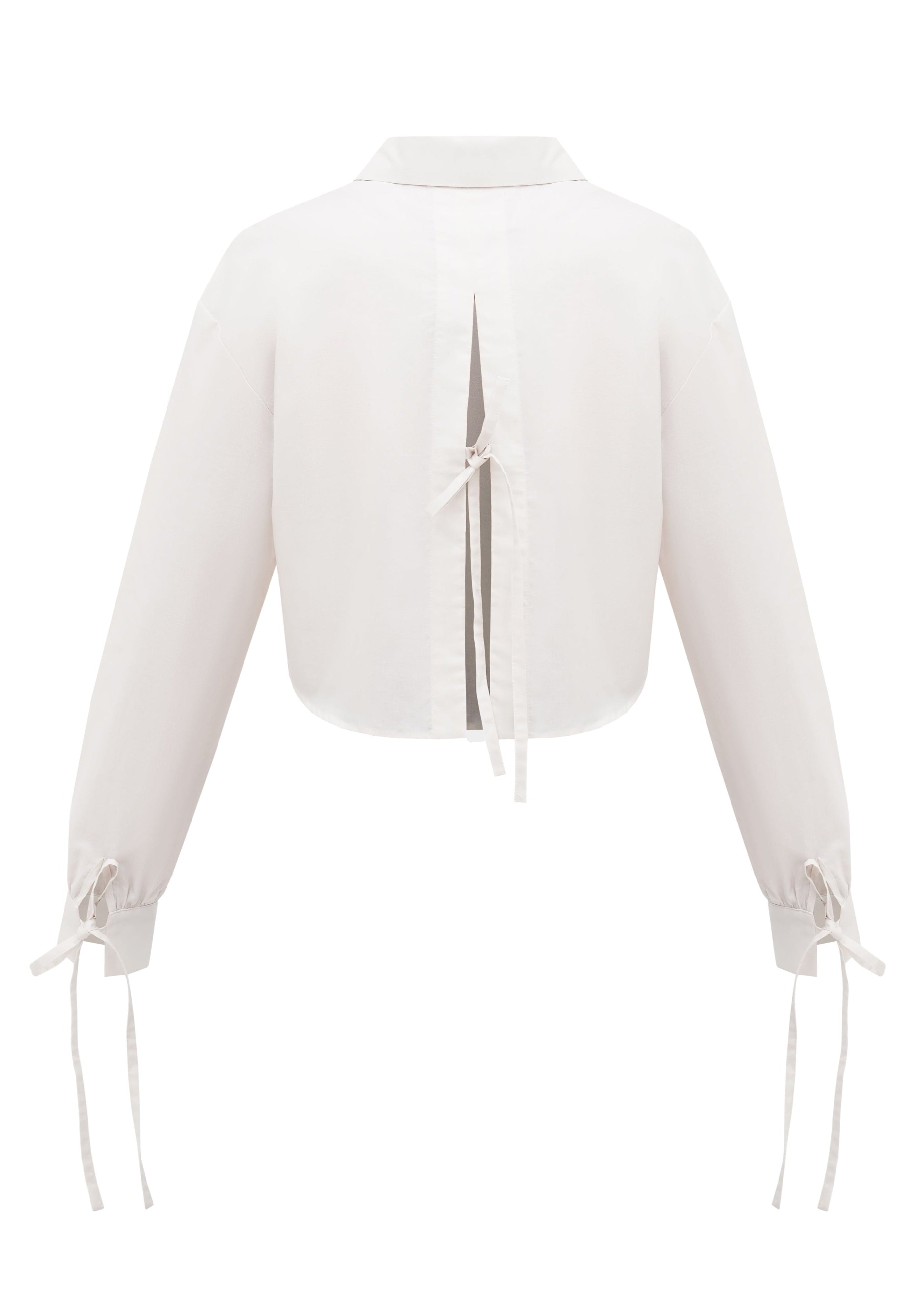 A back of a sustainable organic cotton shirt with three bow-tie details