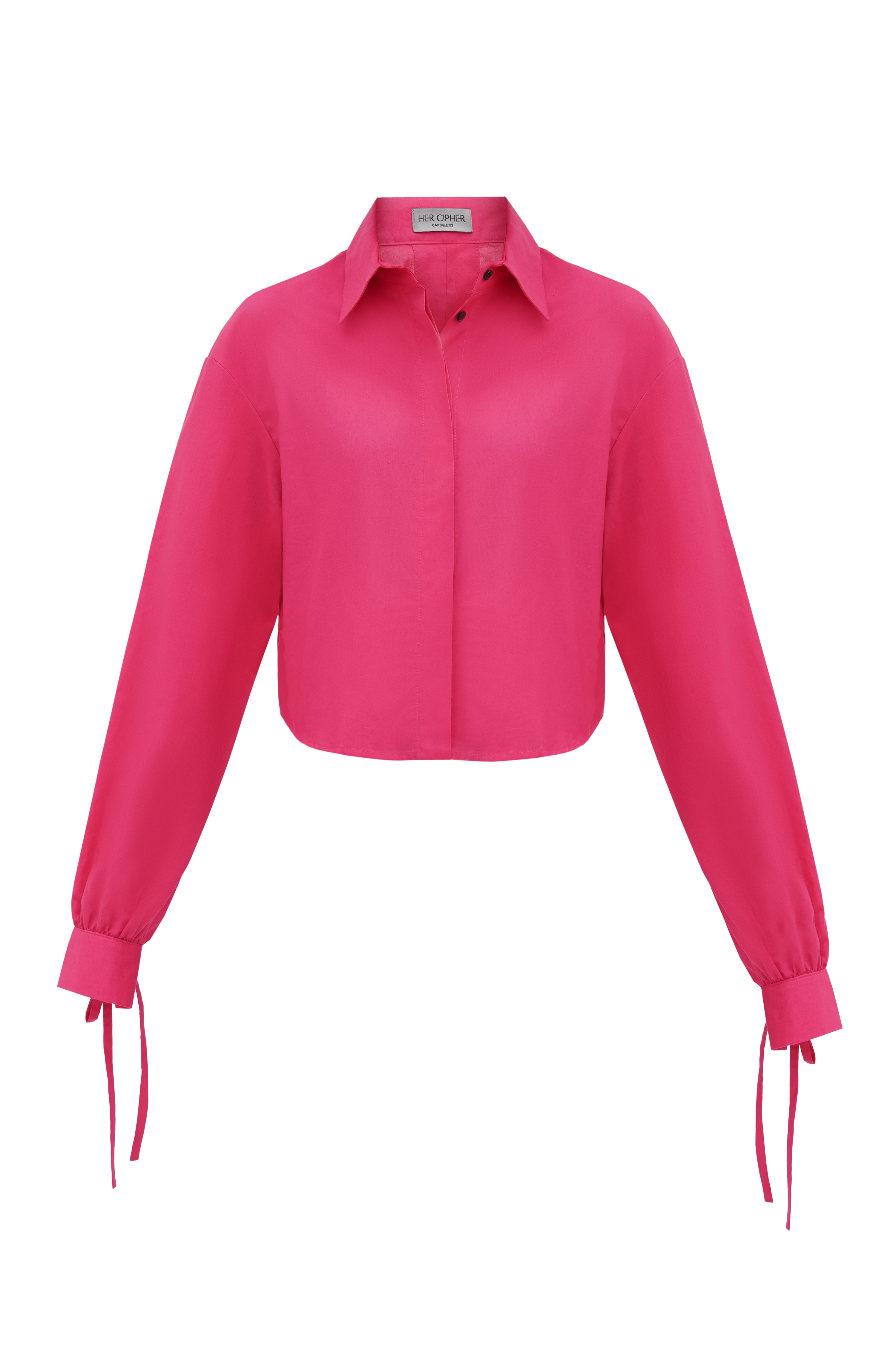 An organic cotton shirt in magenta color with pointed collar and bow-tie details on sleeves