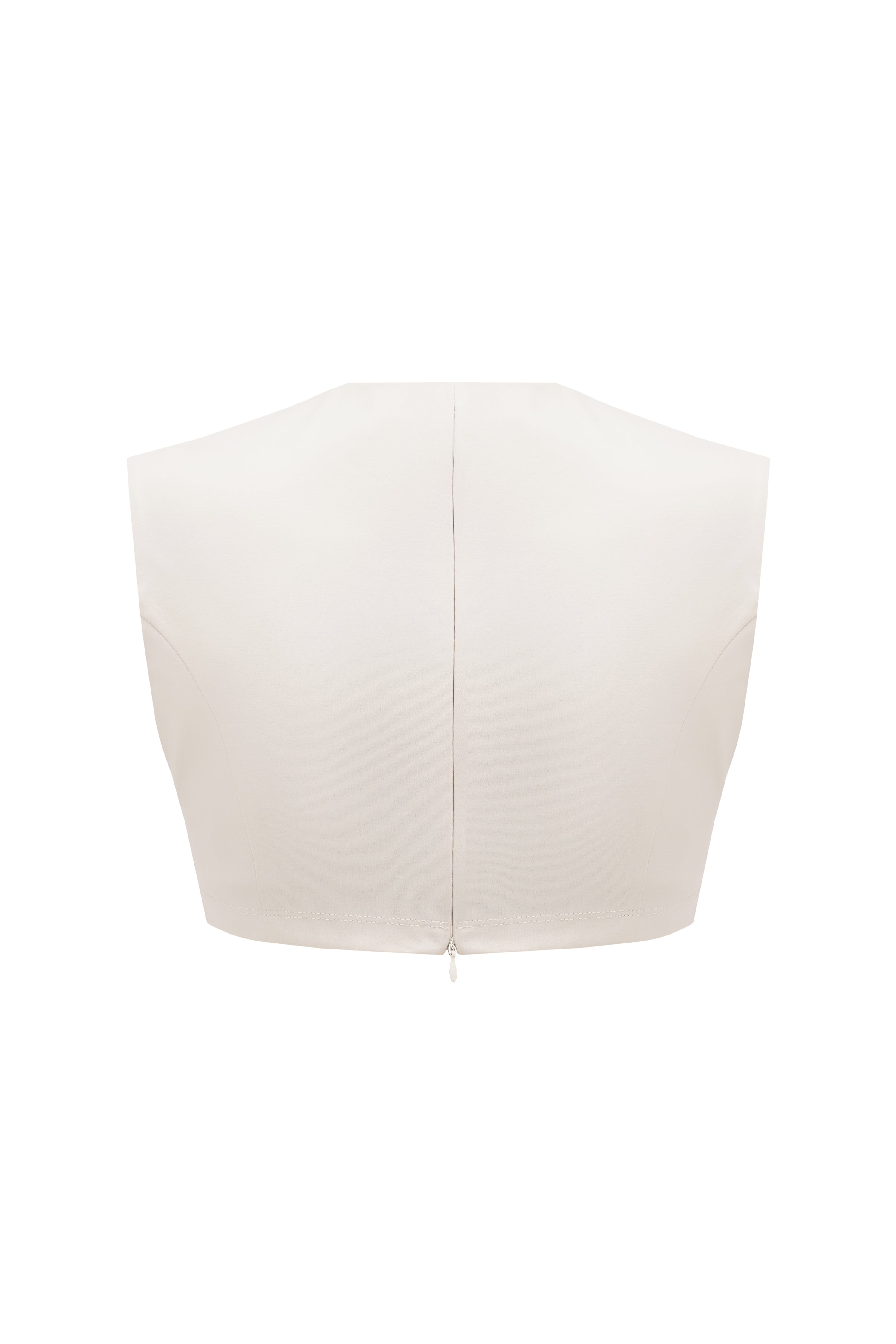 a back of a crop top in light beige color created from 100% organic cotton sustainable with a zipper in a middle